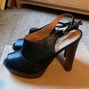 Coach black heeled sling backs size 8